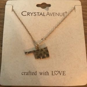 Oklahoma jewelry lot. Includes two necklace and earring set